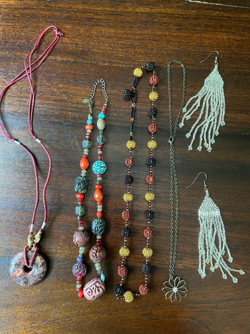 Collection of random necklaces and one pair of earrings